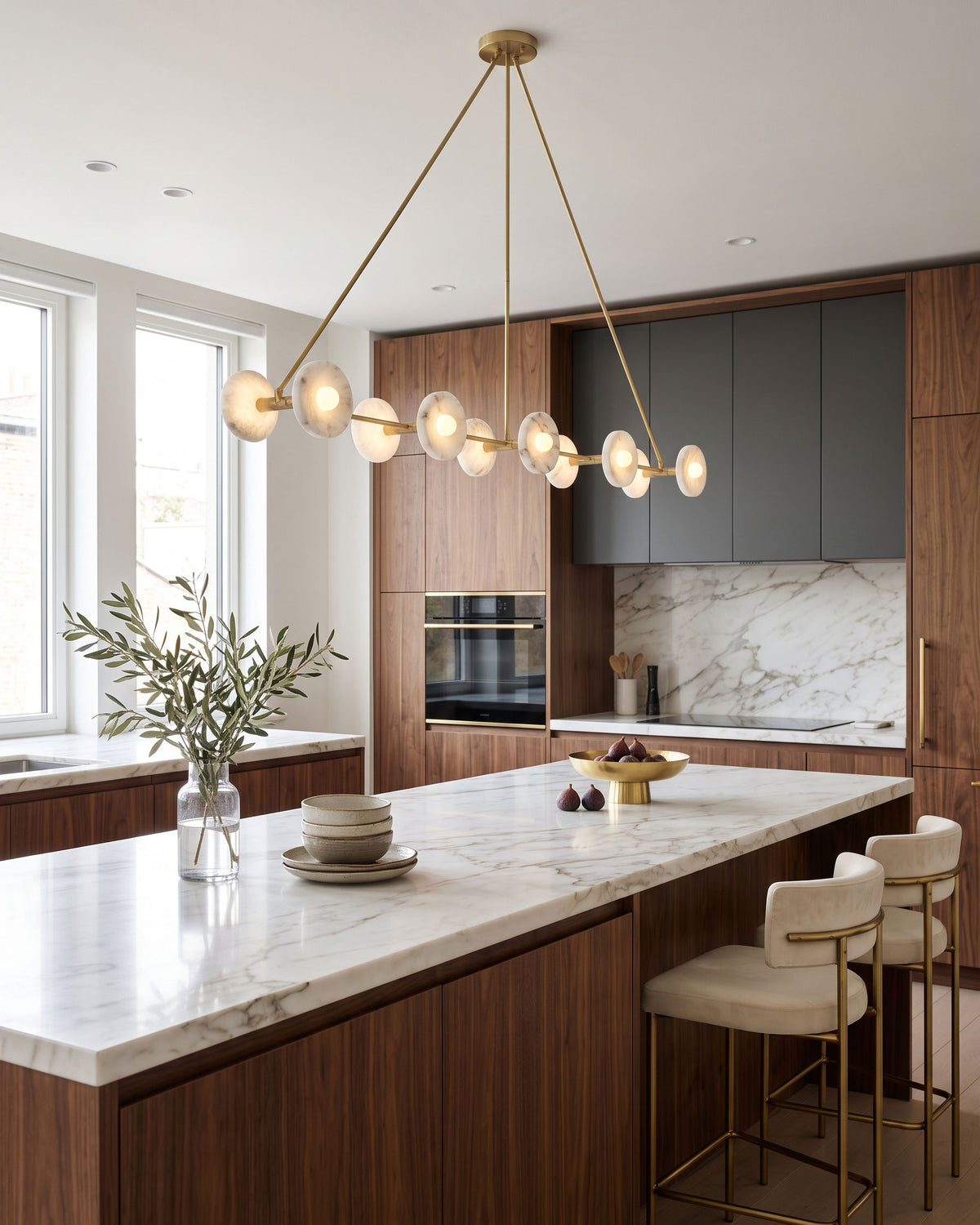 Ryland Alabaster Chandelier hanging over a table